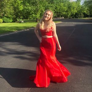 Worn once still has tags and garment bag.